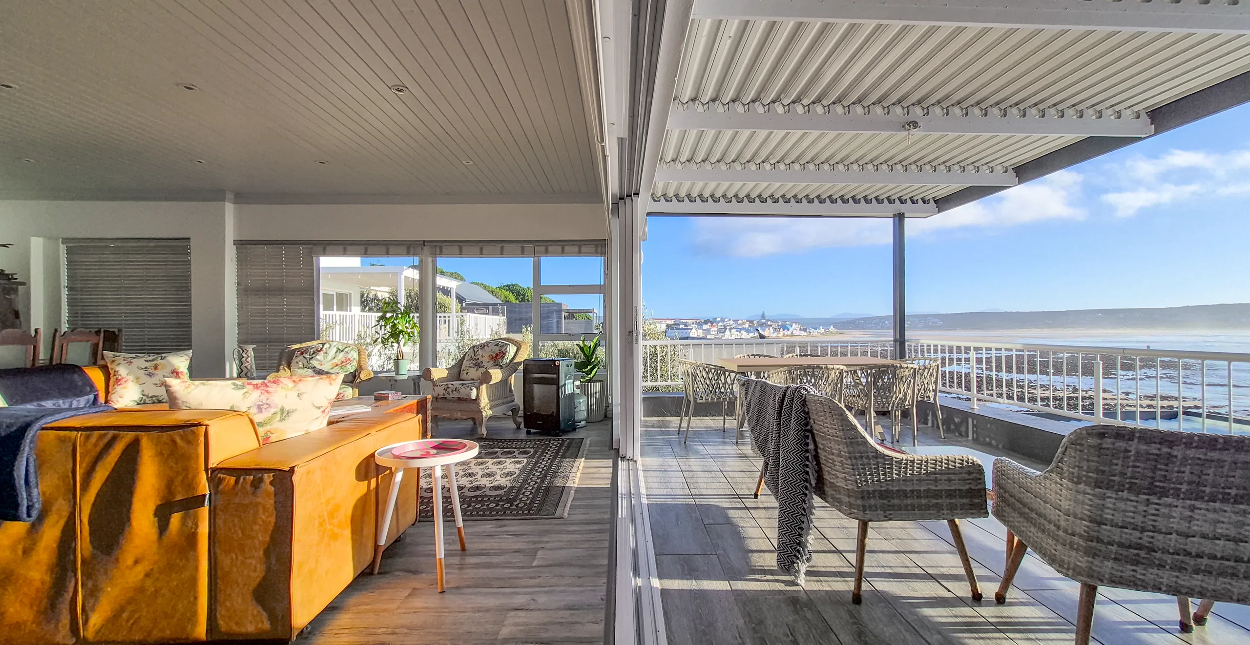 Lounge opening onto the covered patio, Unit Two, Die Hawehuis