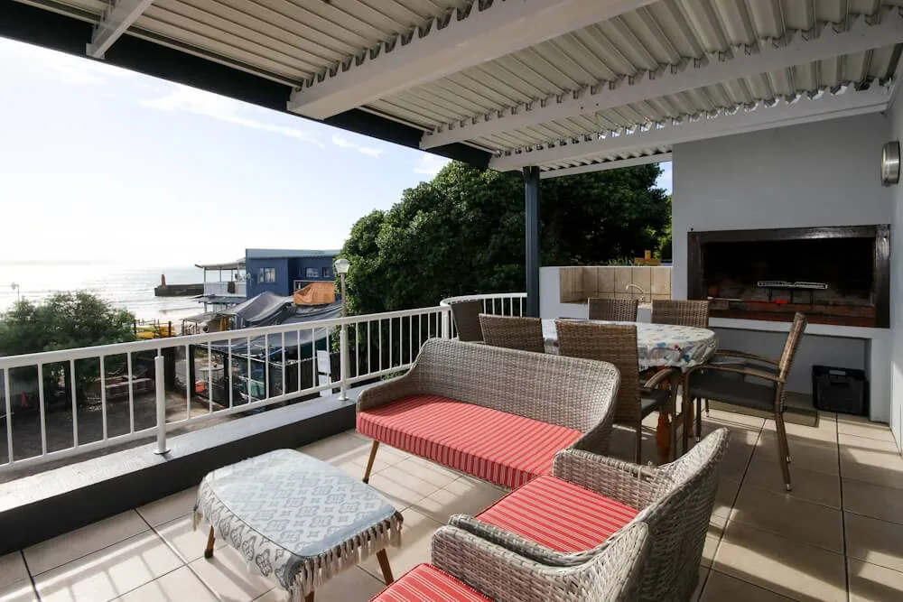 Covered patio and braai area overlooking the bay, Unit One, Die Hawehuis