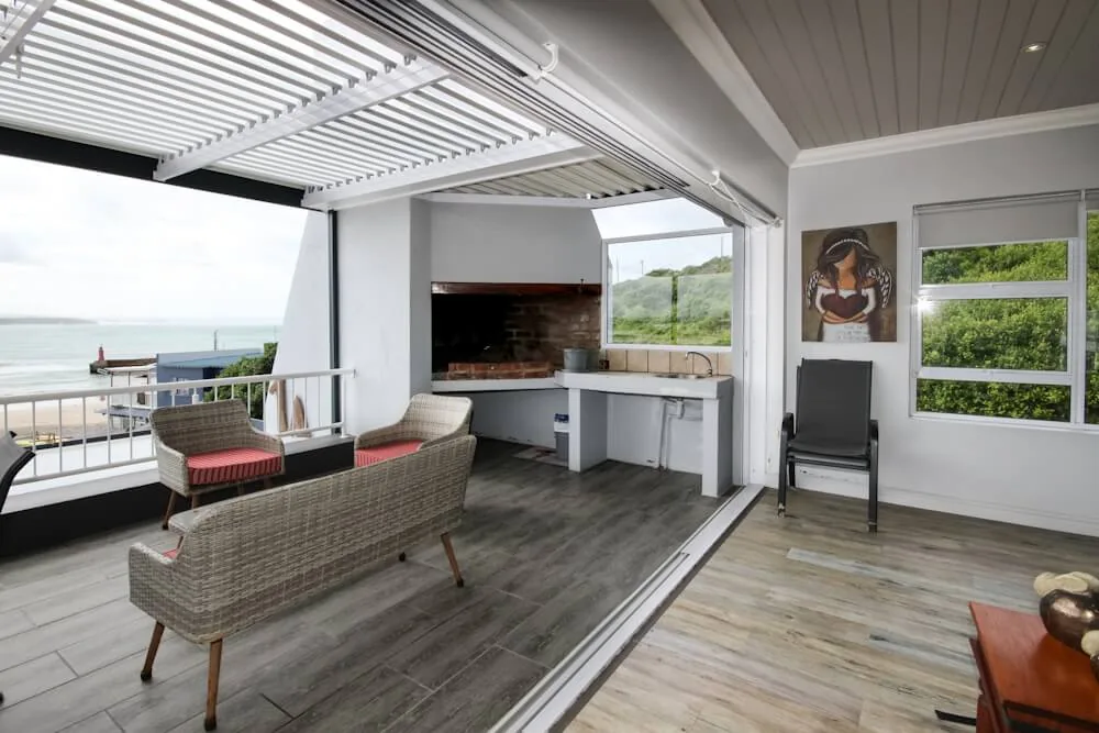 Patio and braai area with harbour views, Unit Two, Die Hawehuis