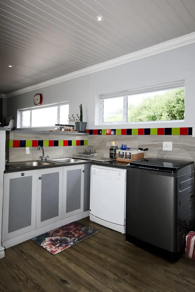 Scullery with double sink, dishwasher and washing machine, Unit Two, Die Hawehuis